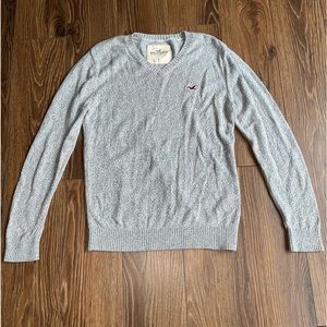 Boys grey Hollister v-neck sweater.